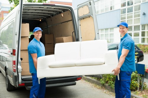 House removalists in Nottinghill loading furniture into a moving truck