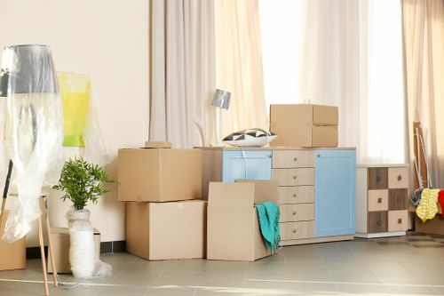 Loading a van for a domestic move with boxes and furniture
