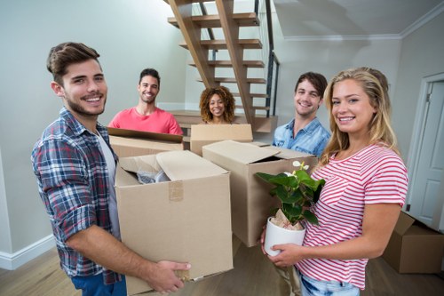House removal service in Nottinghill organising boxes and moving equipment