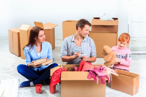 Moving team reviewing a customer complaint form during a relocation service
