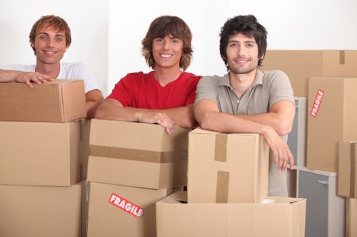 Professional moving team handling items in Notting Hill neighborhood