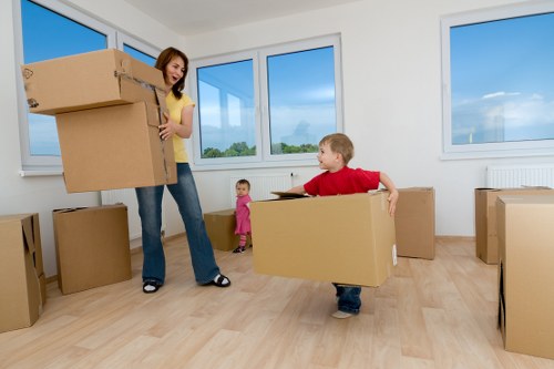 Removalists handling furniture carefully during a townhouse move