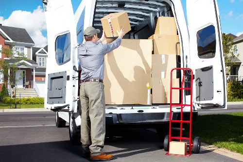 Manager checking complaint records after a house move service