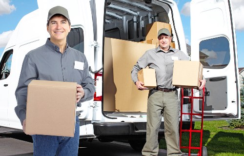 Collection of furniture and household items being prepared for reuse and recycling