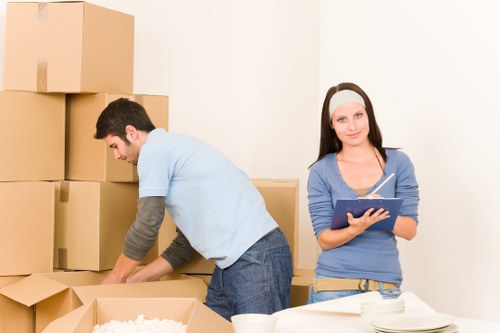 Busy moving crew handling urgent flat relocation in Notting Hill