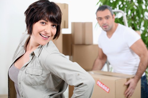Team carrying furniture during a local house move