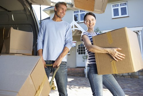 Expert piano removals team securing a piano for transport in Nottinghill