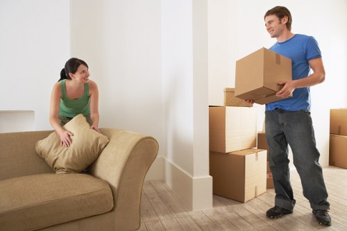 Professional movers assessing a property before beginning removals