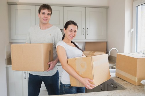 Team handling household items carefully during transport
